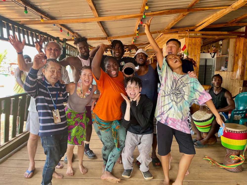 japanese and african people smiling